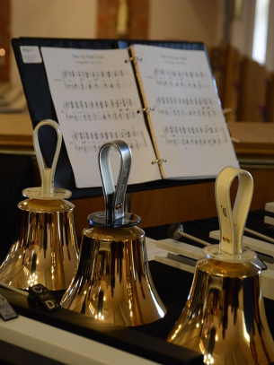 Handbells with sheet music